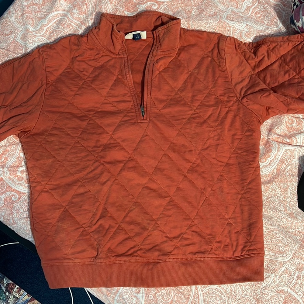 Orange zip up sweater